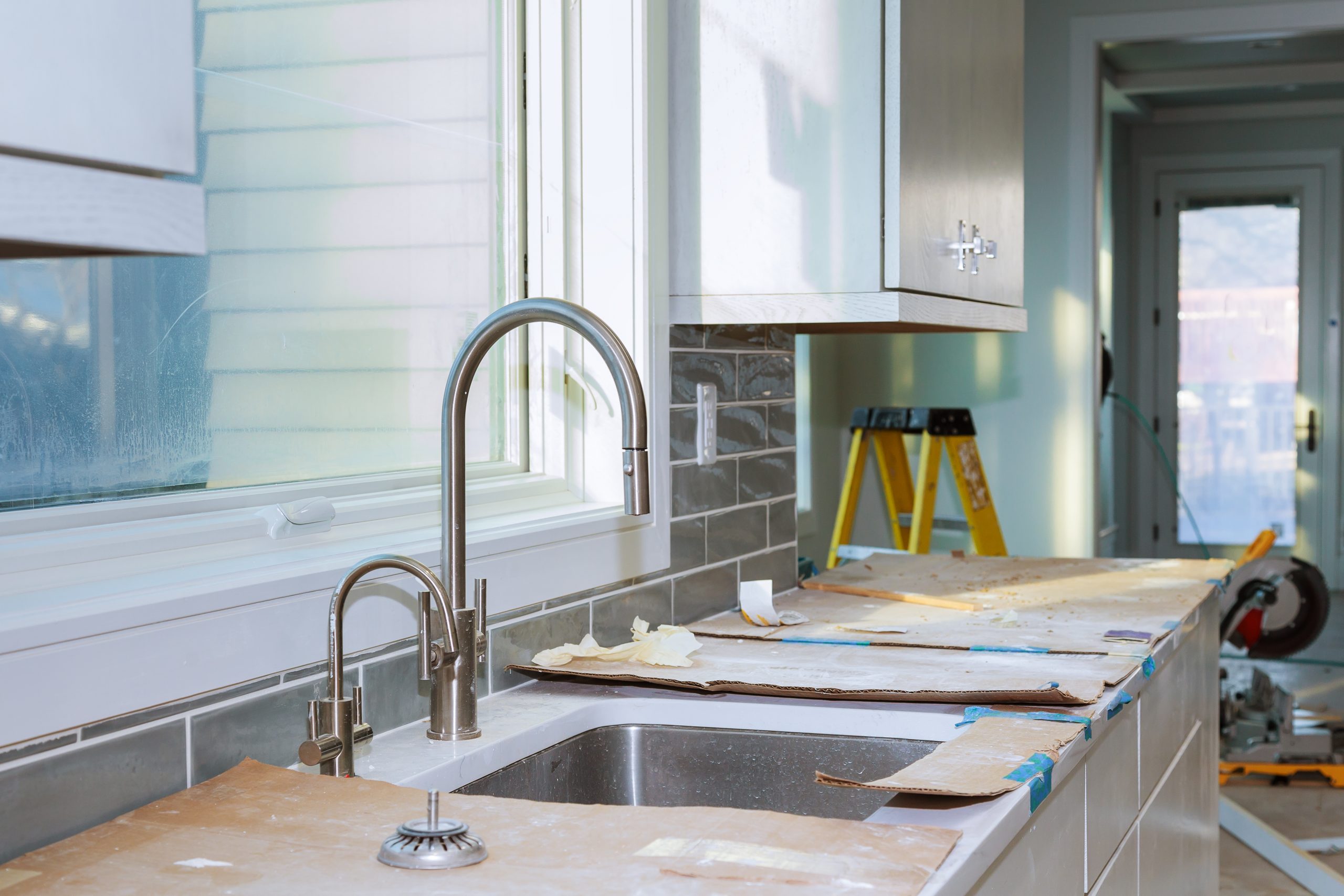 Kitchen cabinets installation Improvement Remodel worm's view installed in a new kitchen AdobeStock 191810000 scaled